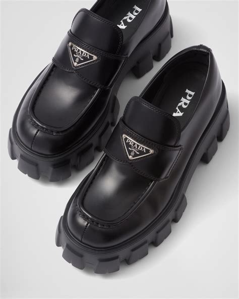 prada sport black leather penny loafers|prada monolith loafers second hand.